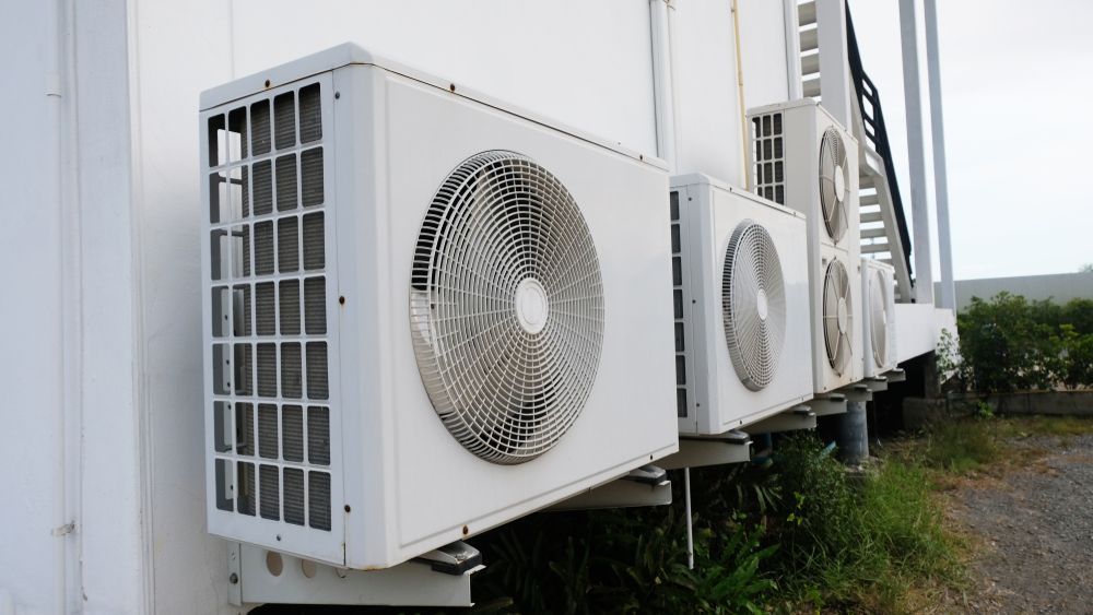 A Row of Air Conditioners on the Side of a Building, Enterprise Air That's Cool in Svensson Heights, QLD