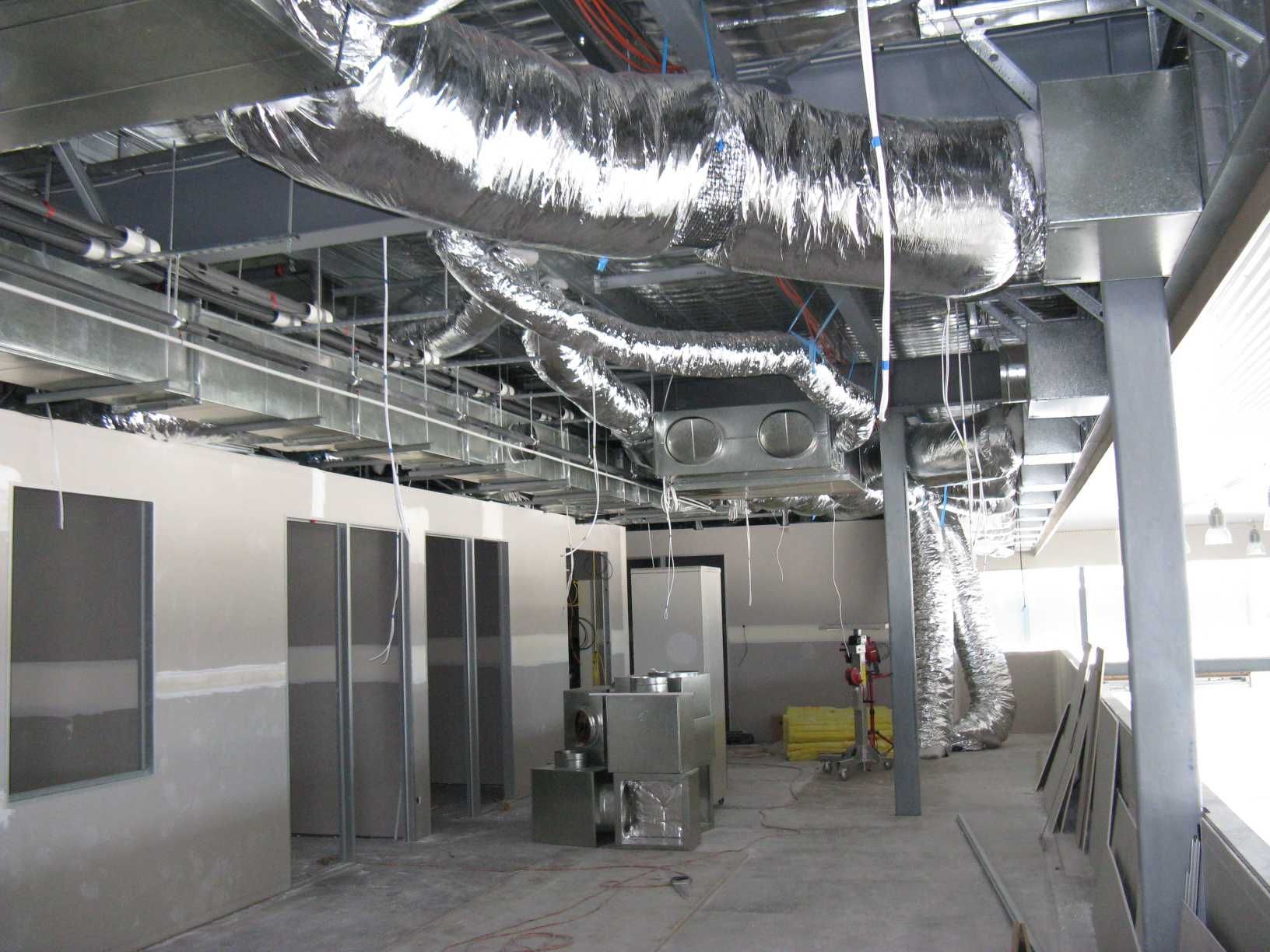 A Room With a Lot of Pipes Hanging From the Ceiling, Enterprise Air That's Cool in Svensson Heights, QLD