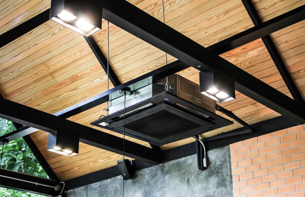 A Ceiling Fan is Hanging From the Ceiling of a Building, Enterprise Air That's Cool in Bucca, QLD