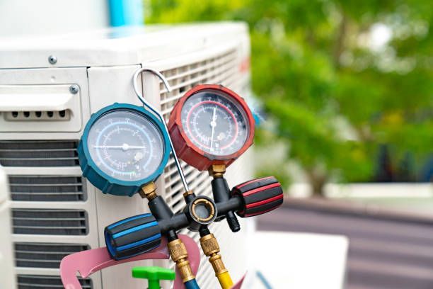 A Couple of Gauges Sitting on Top of an Air Conditioner, Enterprise Air That's Cool in Svensson Heights, QLD