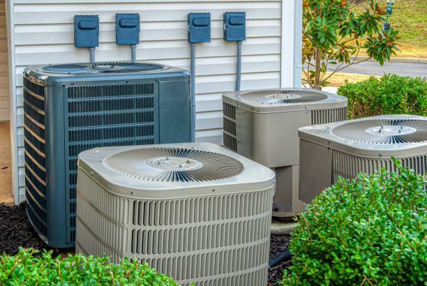 Three Air Conditioners Are Sitting Outside of a House, Enterprise Air That's Cool in Sharron, QLD