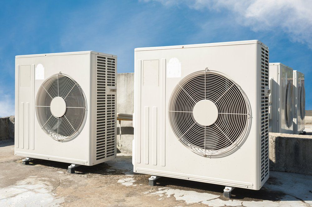 A Row of Air Conditioners Are Sitting on Top of a Roof, Enterprise Air That's Cool in Coral Cove, QLD