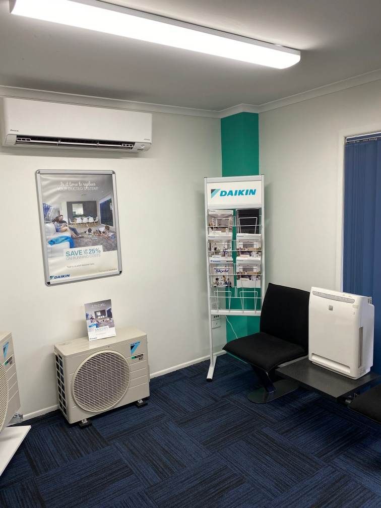 A Waiting Room With a Chair, Air Conditioner, and a Magazine Rack, Enterprise Air That's Cool in Svensson Heights, QLD